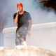 Fred Durst climbing out of a giant toilet at Ozzfest in 1999 (Photo: George De Sota/Redferns/Getty Images)